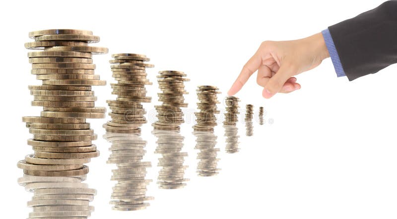 Spalten der Münzen getrennt auf Weiß stockbild Spalten der Münzen getrennt auf Weiß stockbild