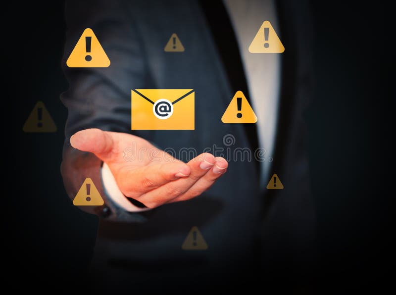Spam mail and message concept with floating electronic mail design over the hand. Spam, virus, malware, error, warning, yellow royalty free stock photography