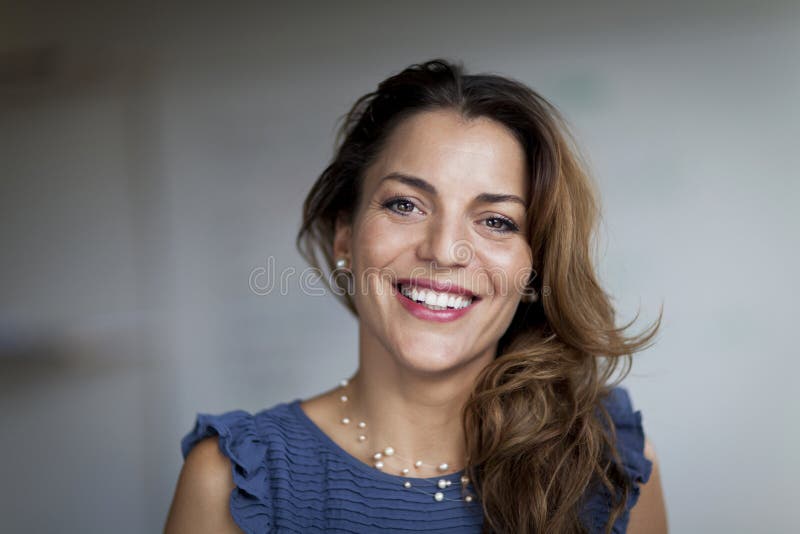 Spanish Businesswoman Smiling at the Camera. at the Office. Stock Photo Image of customer
