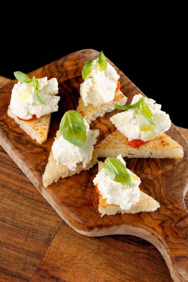 Spanish Food Tapas. Toasted Bread with Fresh Cheese Stock Photo Image