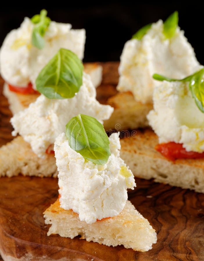Spanish Food Tapas. Toasted Bread with Fresh Cheese Stock Photo Image