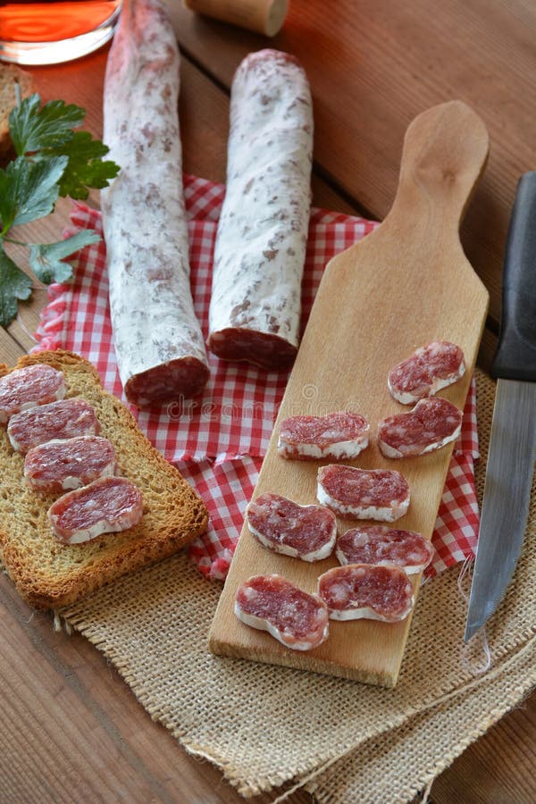 Spanish Fuet Salami on a Cutting Board Stock Photo Image of spiced