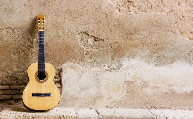 Španielska gitara na staré steny, skopírujte odstup.