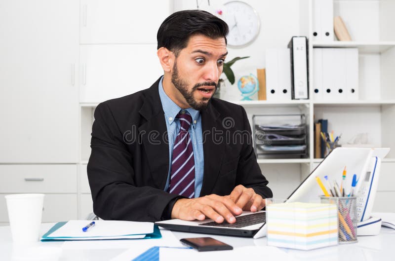 Spanish Male Worker is Having Complicated Issue with Project Stock