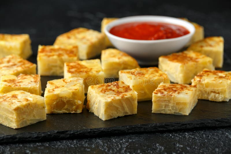 Spanish Potato Frittata Tapas with Tomato Sauce on Stone Board Stock Image Image of green