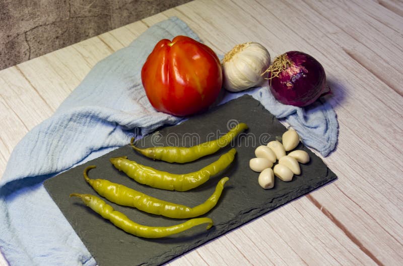 Spanish Tapa of Beer with Chilli Peppers, Tomatoes and Garlic Stock