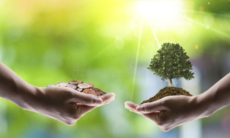 Sparande energibegrepp med jord och att plantera för träd på volontärer arkivbild Sparande energibegrepp med jord och att plantera för träd på volontärer arkivbild