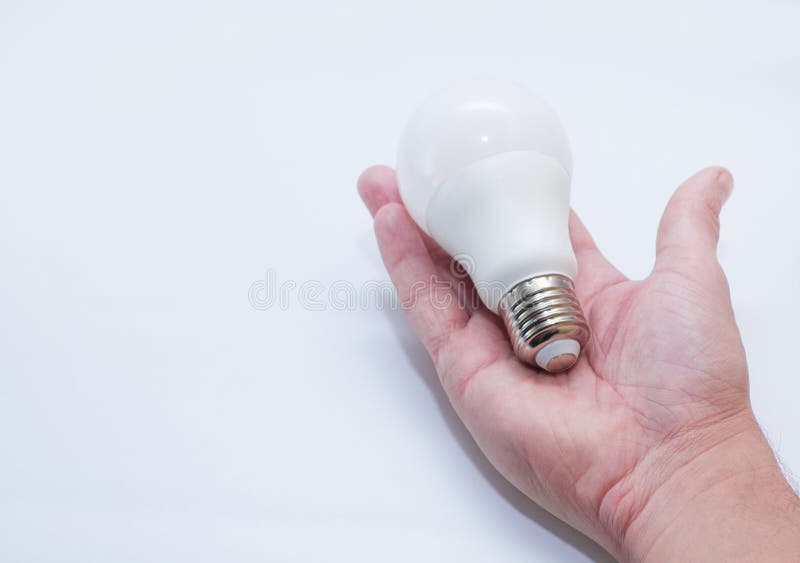 sparande för lampa för kulaenergihand arkivfoton sparande för lampa för kulaenergihand arkivfoton