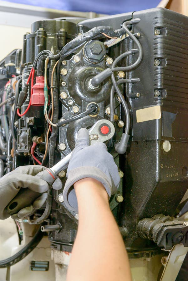 Spark plug replacement work royalty free stock photo