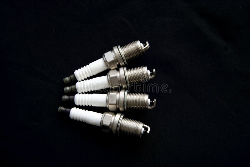 Spark plugs for the car. stock photo. Image of fence 215746208