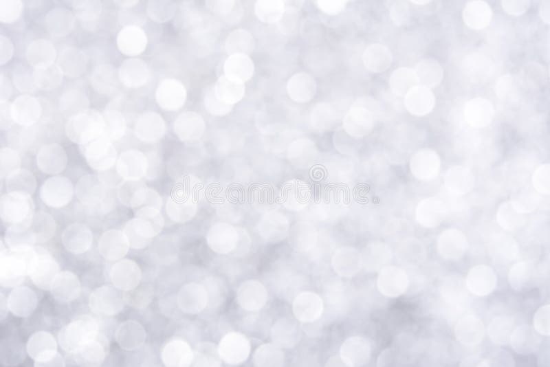 Sparkle glittery white bokeh abstract background