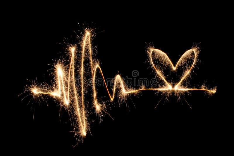 Sparkler 2 del cuore dell'onda fotografia stock Sparkler 2 del cuore dell'onda fotografia stock