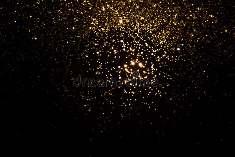 Brilhos dourados a cair fotos de stock royalty free