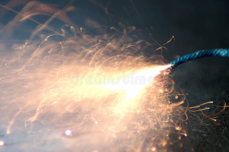 Fuse Burning With Sparkles And Smoke On Black Background. Dynamite  Firecracker Green Fuse. Stock Photo, Picture and Royalty Free Image. Image  119485661.