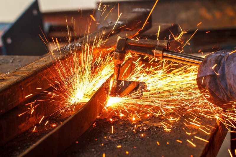 Sparks while cutting steel stock photo. Image of smoke 58529410