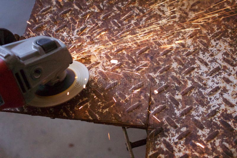 Sparks Fly from and Angle Grinder on Diamond Plate Stock Photo Image of buffing, diamond