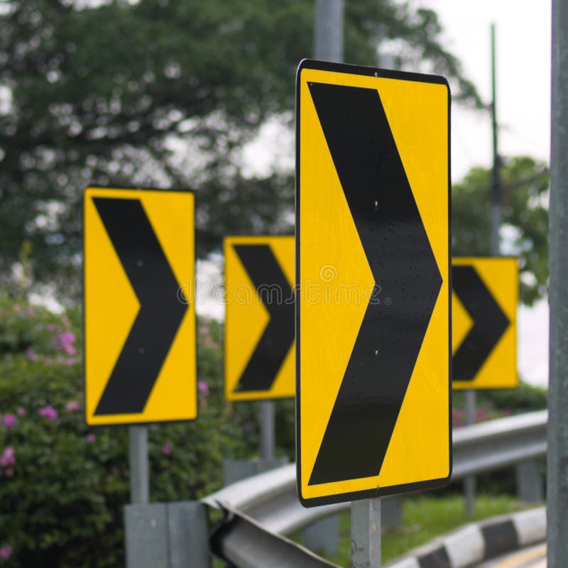 Chevrons marking a bend in a road. Chevrons marking a bend in a road