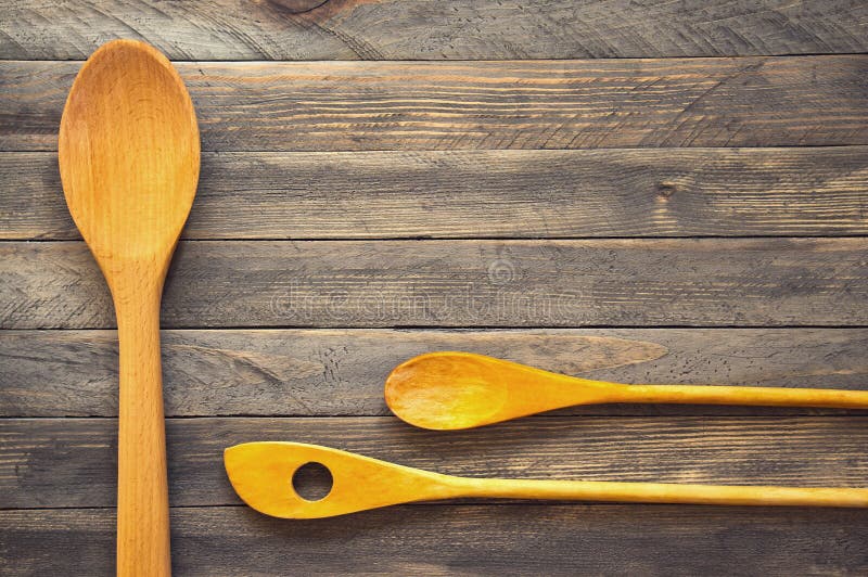 Spatole e cucchiai di legno della cucina fotografia stock Spatole e cucchiai di legno della cucina fotografia stock