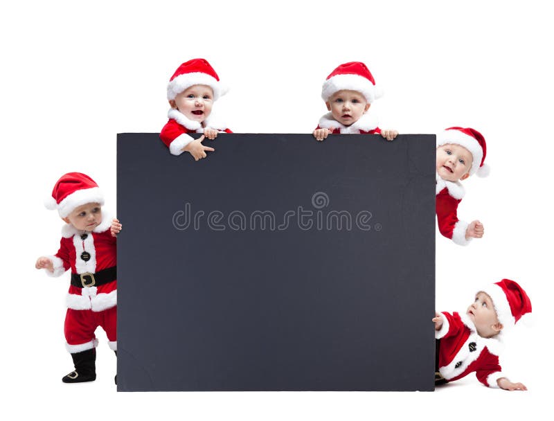Spazio in bianco dell'insegna della pubblicità del nero della tenuta del bambino di cinque Santa Claus fotografia stock libera da diritti Spazio in bianco dell'insegna della pubblicità del nero della tenuta del bambino di cinque Santa Claus fotografia stock libera da diritti