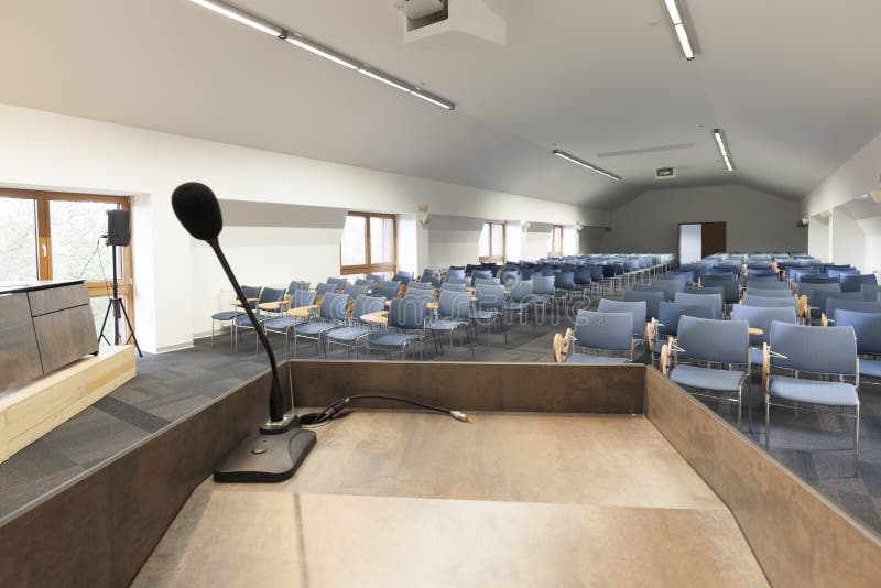 Speaker S Table in Interior of a Modern Conference Hall Stock Photo