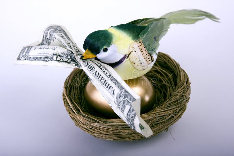 Bird in nest on golden egg with dollar bill in beak. Bird in nest on golden egg with dollar bill in beak.