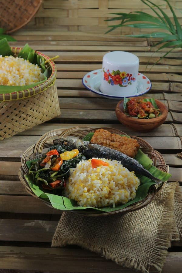 Special Dish, Rice Mixed with Corn with Tempeh, Fried Fish and