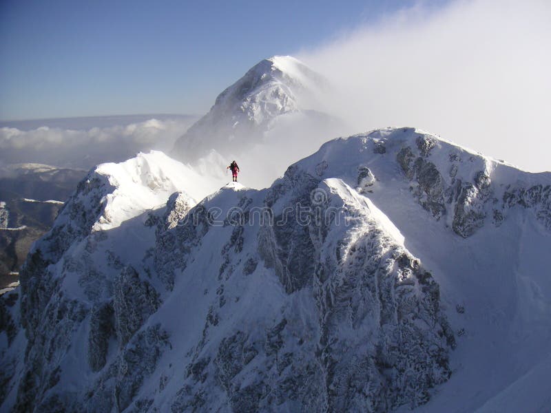 Conquer the top of the mountain, crystal clear weather. Conquer the top of the mountain, crystal clear weather