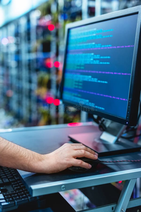 IT specialist working in bitcoin and crypto currency mining farm stock photo