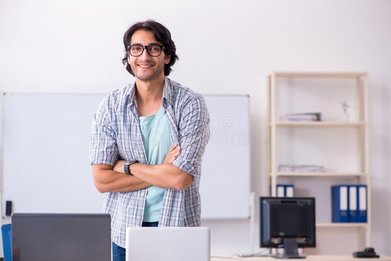 The it specialist working in the office stock photos