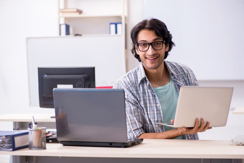 The it specialist working in the office royalty free stock photos
