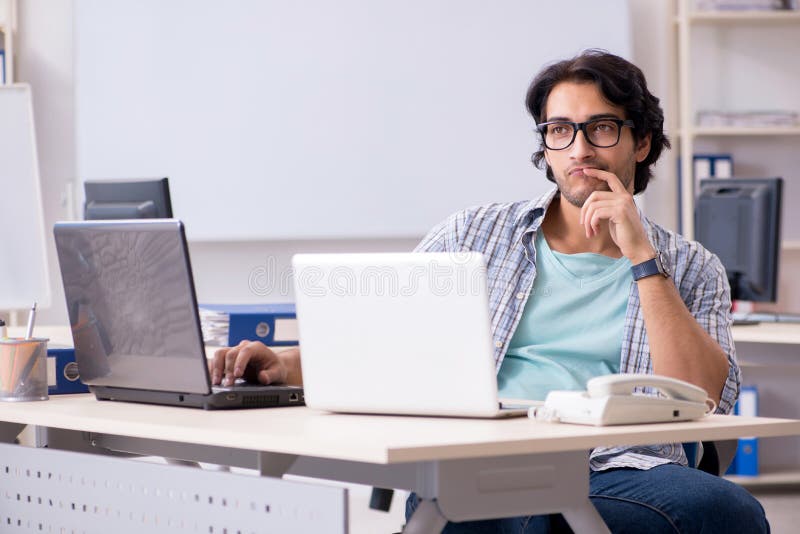 The it specialist working in the office stock photography