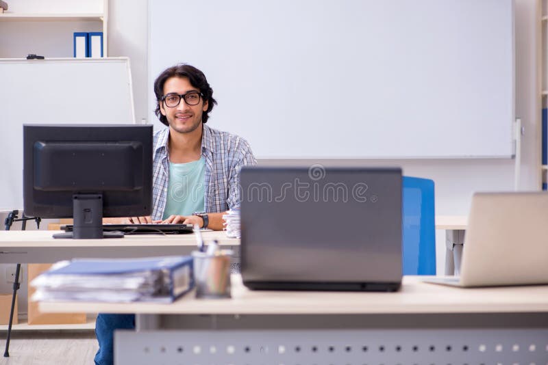 The it specialist working in the office stock photography