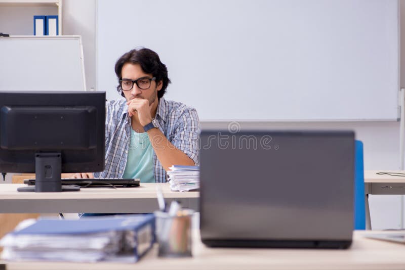 The it specialist working in the office stock photos