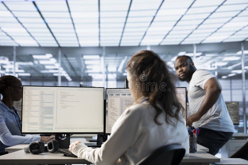 IT specialist working on PC with AI machine learning algorithms stock photography