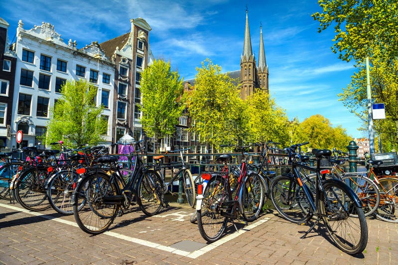 Spectacular cityscape with traditional Dutch buildings and bicycles, Amsterdam, Netherlands stock photography Spectacular cityscape with traditional Dutch buildings and bicycles, Amsterdam, Netherlands stock photography