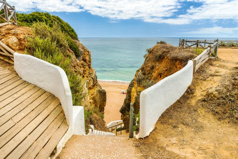 Spectacular walkway on the cliffs by Praia Nova in Porches, Algarve, Portugal