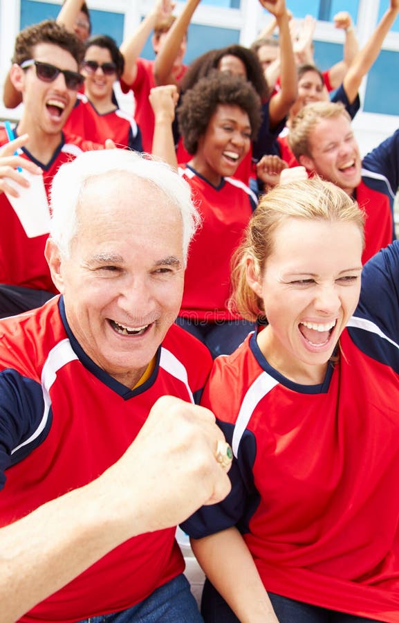 Spectators In Team Colors Watching Sports Event royalty free stock image Spectators In Team Colors Watching Sports Event royalty free stock image