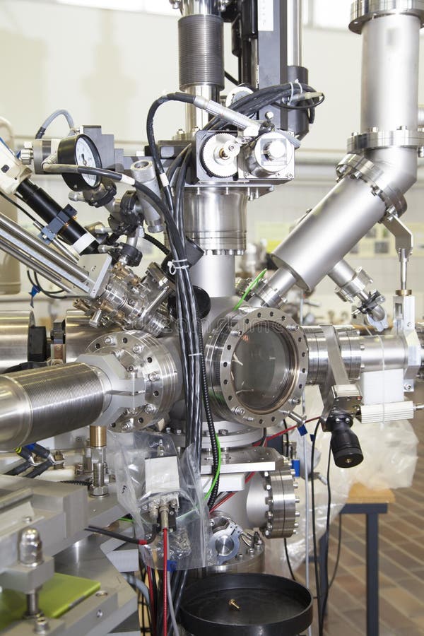 View of Important electronic and mechanical parts of Mass spectrometer in ION Accelerator command room, CNC machined parts, selective focus. View of Important electronic and mechanical parts of Mass spectrometer in ION Accelerator command room, CNC machined parts, selective focus