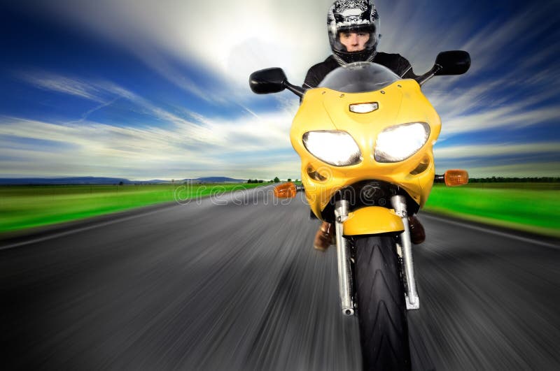 Motorcycle moving very fast along motion blurred road. Power tech stock images, royalty-free photos and pictures