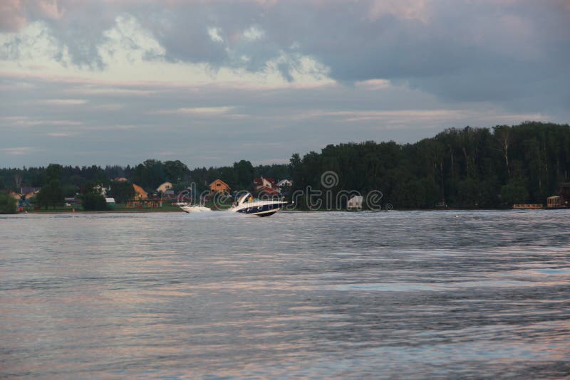 Speed boat on the lake stock photo. Image of landscape 115138416