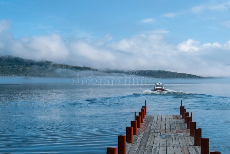 Speed boat departing from dock