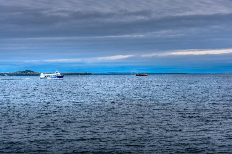 Speed boat taking tourists to Mackinac Island in the Upper Peninsula Michigan