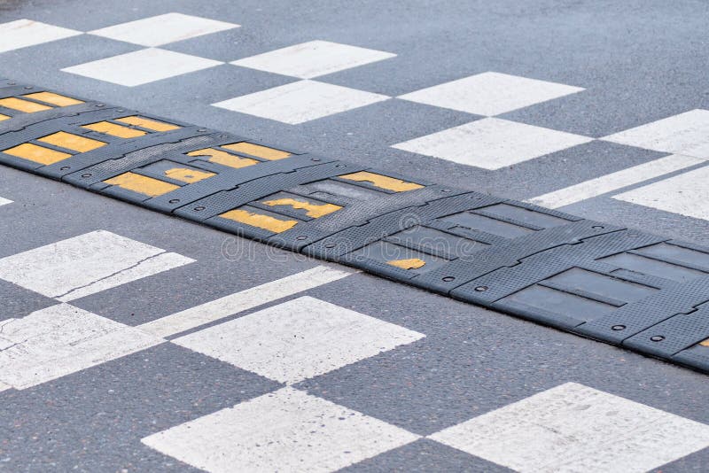 Speed bump on the pavement stock image. Image of bump - 174838745