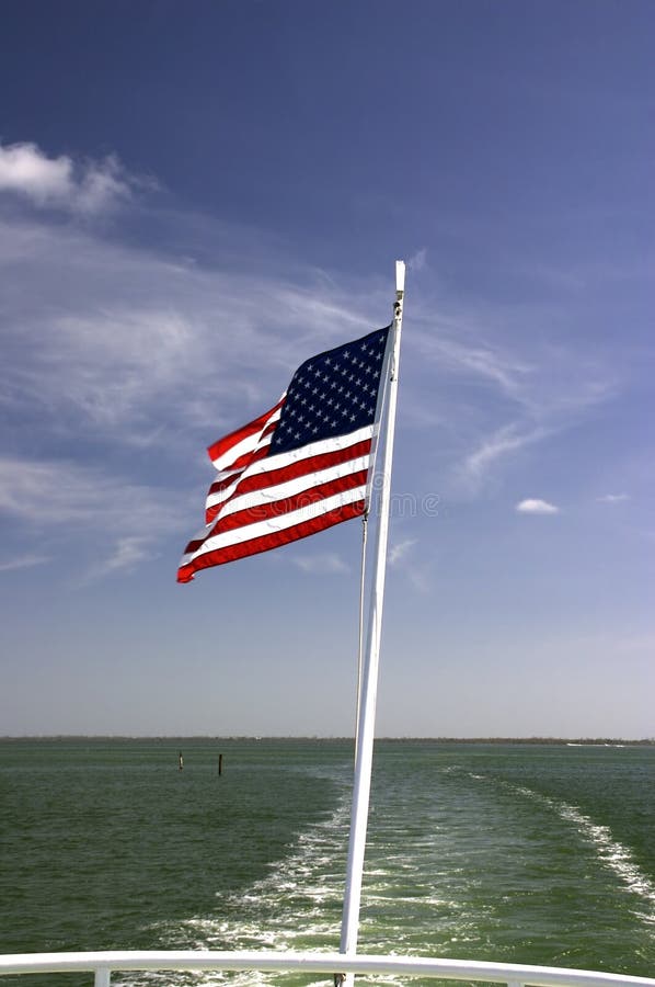 Speedboat and Wake and Flag