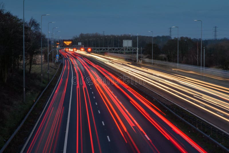 Light Trails From Fast Moving Traffic On M42 Motorway At Night Stock light-trails-from-fast-moving-traffic-on-m42-motorway-at-night-stock