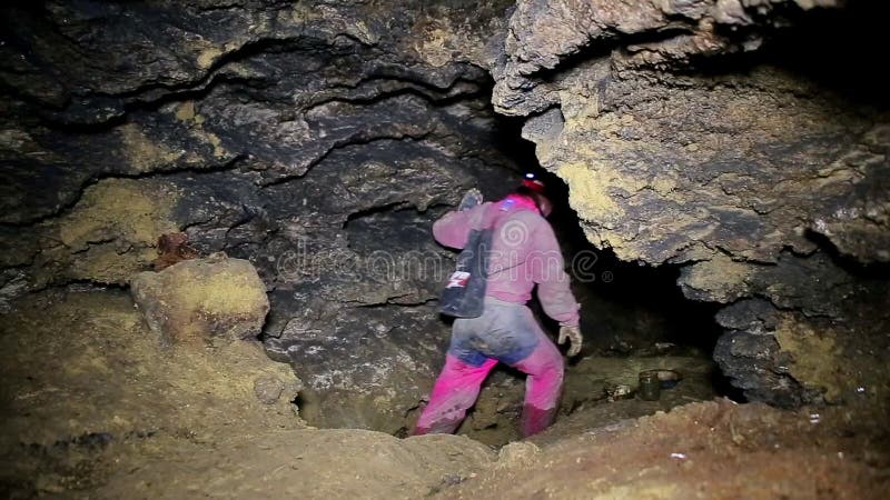 Speleologist take interview about karst cave