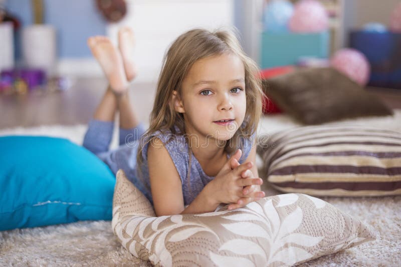 Little Girl Lying Down Rug Smiling Stock Photos - Free & Royalty-Free ...