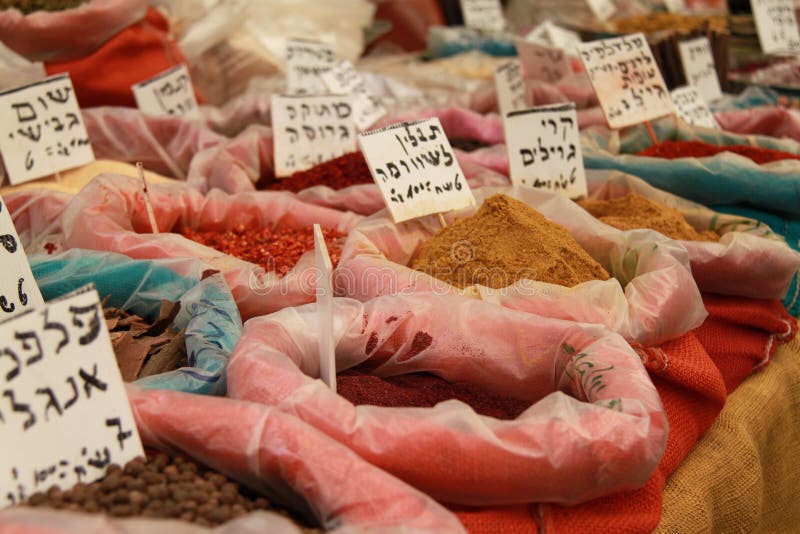 Spices in an israeli market with hebrew signs. Spices in an israeli market with hebrew signs