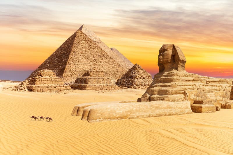 The Sphinx and the Pyramids of Giza, wonders of the world in Egypt, sunset view