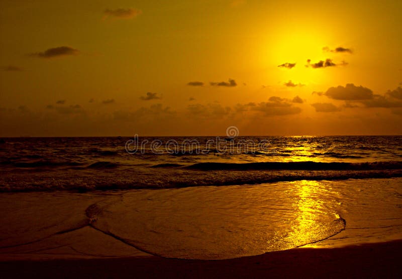 An isolated evening moment at Calangut beach of Goa, India. An isolated evening moment at Calangut beach of Goa, India.